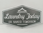 Laundry Today Metal Sign 12x20in